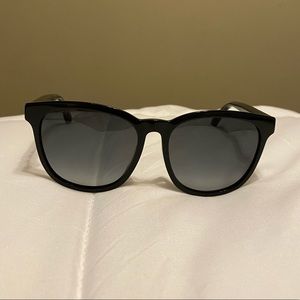 Gucci sunglasses with stars and bees.